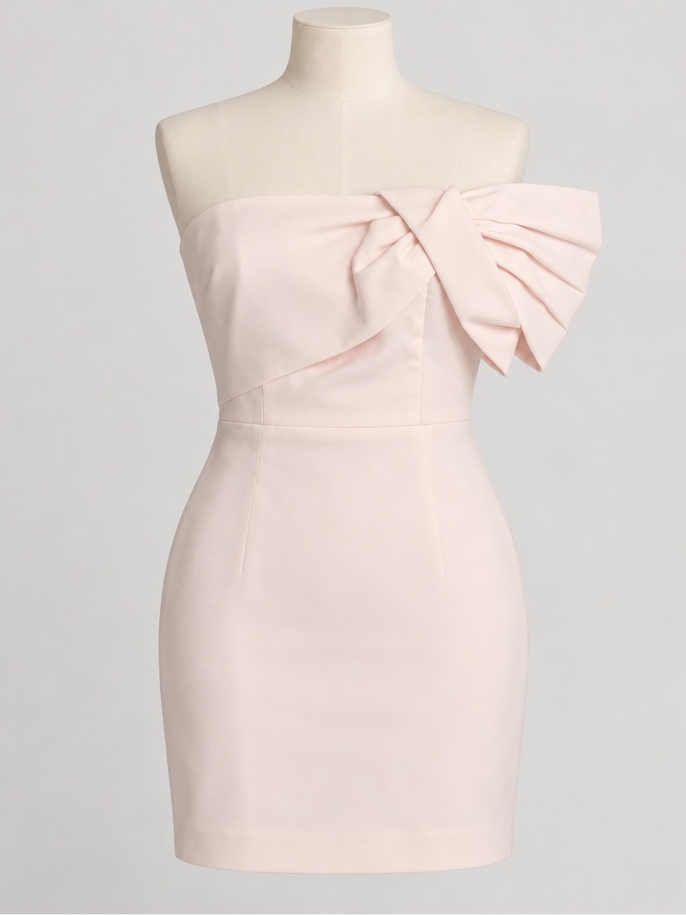 Karlie Strapless Sculpted Bow Bodycon Dress in Pale Pink